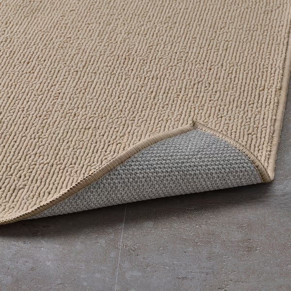 FINTSEN Bath mat, beige, 40x60 cm