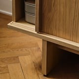 STOCKHOLM 2025 TV bench with sliding doors, oak veneer, 179x42x56 cm